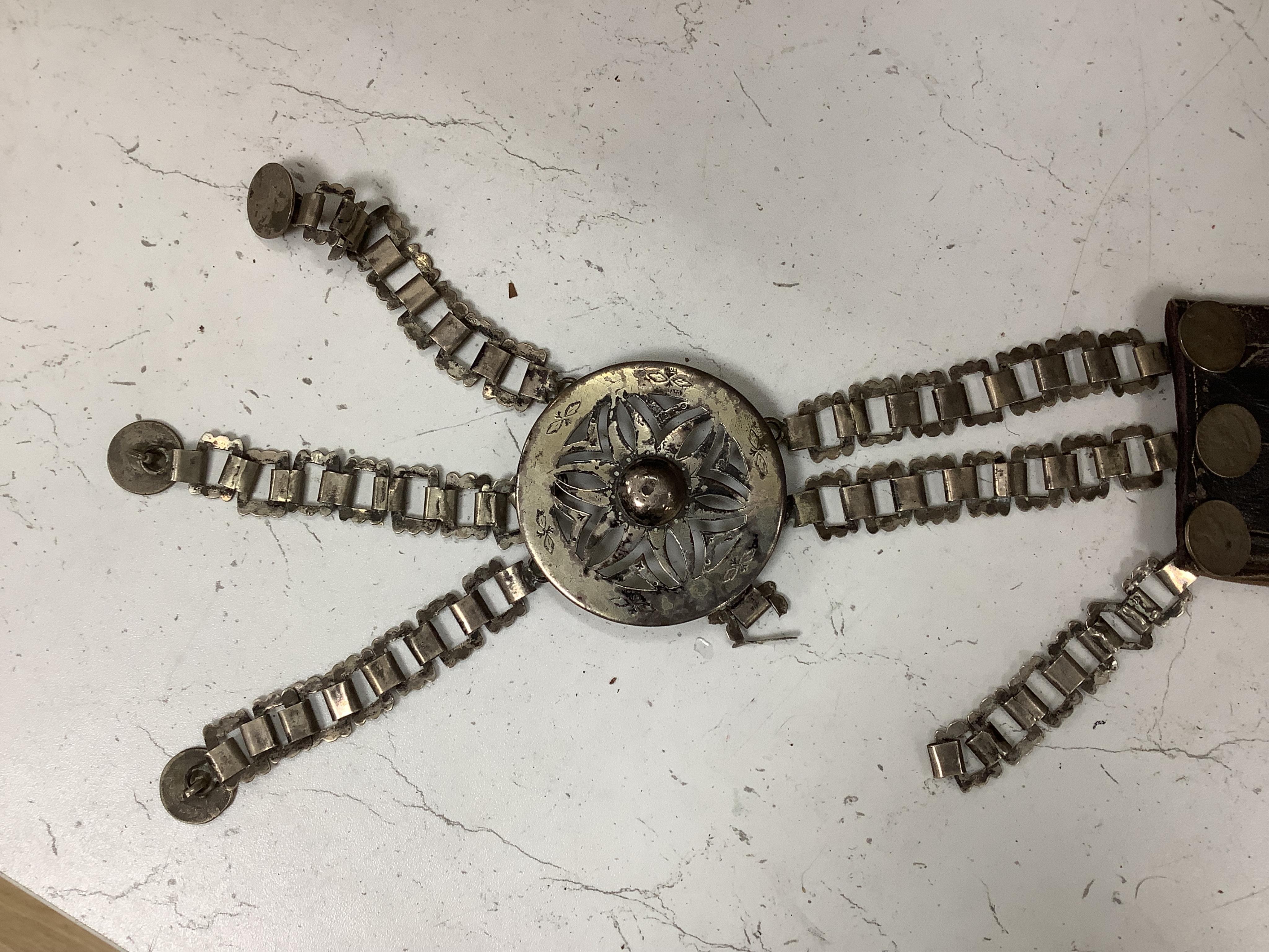 A group of Argentinian Gaucho spurs, bolas, bull whip, daggers and hanger, Longest 100cm
